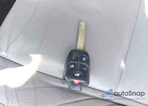 2011 Honda Odyssey Ex-L z USA, uszkodzony, nr VIN 5FNRL5H69BB039484